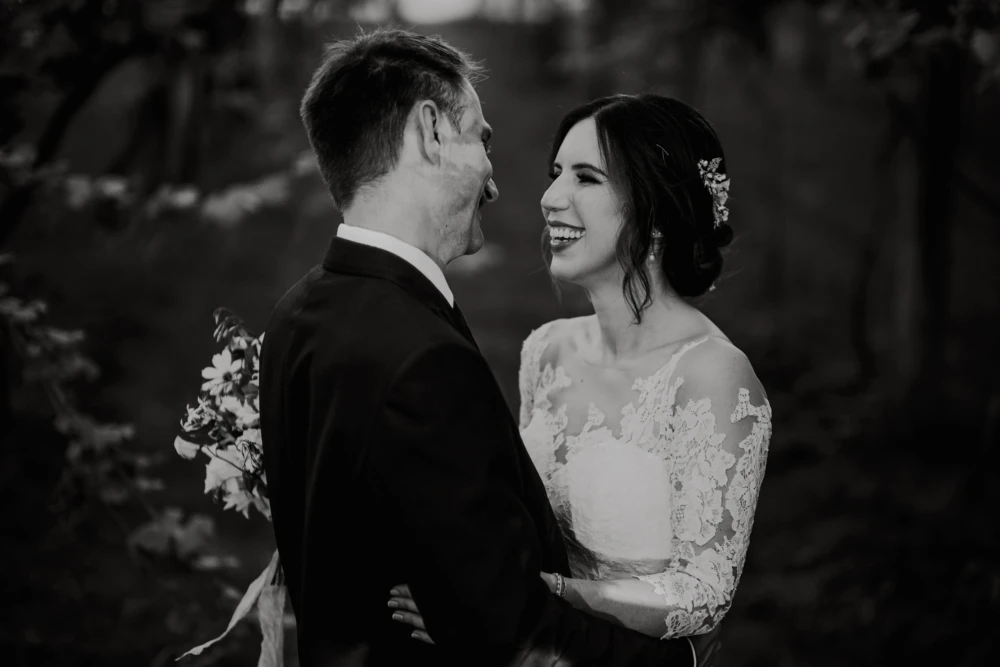 Bride and groom looking lovingly at each other