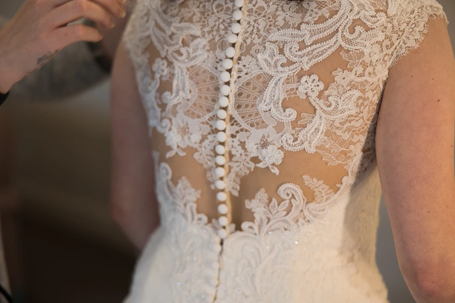 Lace a button detail back of wedding dress